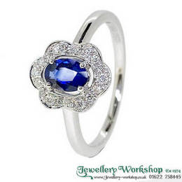18ct White Gold 0.53ct Sapphire and 0.14ct Diamond Cluster Ring